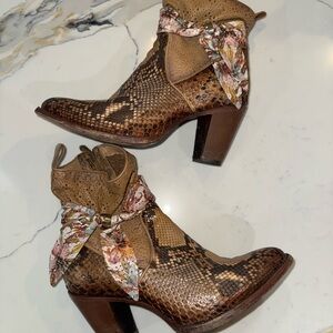 Stylish Brown Snakeskin Ankle Boots with Floral Accent